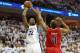 Rudy Gay making a jumper against Randy Foye