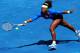MADRID, SPAIN - MAY 11: Serena Williams of the USA stretches to play a backhand to Maria Sharapova of Russia in her quarter final match during the Mutua Madrilena Madrid Open tennis tournament at the Caja Magica on May 11, 2012 in Madrid, Spain. (Photo by Jasper Juinen/Getty Images)