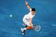 MADRID, SPAIN - MAY 11: Novak Djokovic of Serbia jumps to play a backhand in his quarter final match against his fellow countryman Janko Tipsarevic during the Mutua Madrilena Madrid Open tennis tournament at the Caja Magica on May 11, 2012 in Madrid, Spain. (Photo by Jasper Juinen/Getty Images)