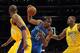 LOS ANGELES, CA - MARCH 29: Kevin Durant #35 of the Oklahoma City Thunder cuts between Metta World Peace #15 and Kobe Bryant #24 of the Los Angeles Lakers at Staples Center on March 29, 2012 in Los Angeles, California. NOTE TO USER: User expressly acknowledges and agrees that, by downloading and or using this photograph, User is consenting to the terms and conditions of the Getty Images License Agreement. (Photo by Harry How/Getty Images)