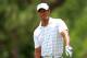 PONTE VEDRA BEACH, FL - MAY 12: Tiger Woods of the United States looks on from the ninth hole during the third round of THE PLAYERS Championship held at THE PLAYERS Stadium course at TPC Sawgrass on May 12, 2012 in Ponte Vedra Beach, Florida. (Photo by Sam Greenwood/Getty Images)