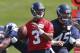 RENTON, WA - MAY 11: Quarterback Russell Wilson #3 of the Seattle Seahawks looks to pass during minicamp at the Virginia Mason Athletic Center on May 11, 2012 in Renton, Washington. (Photo by Otto Greule Jr/Getty Images)