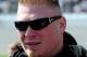 DAYTONA BEACH, FL - FEBRUARY 13: MMA fighter Brock Lesnar walks in the garage area during the NASCAR Nationwide Series Drive4COPD 300 at Daytona International Speedway on February 13, 2010 in Daytona Beach, Florida. (Photo by Sam Greenwood/Getty Images)