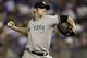 KANSAS CITY, MO - MAY 4: David Robertson #30 of the New York Yankees pitches against the Kansas City Royals in the ninth inning at Kauffman Stadium May 4, 2012 in Kansas City, Missouri. The Yankees won 6-2. (Photo by Ed Zurga/Getty Images)