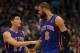 DALLAS, TX - MARCH 06: Jeremy Lin #17 of the New York Knicks talks with Tyson Chandler during play against the Dallas Mavericks at American Airlines Center on March 6, 2012 in Dallas, Texas. NOTE TO USER: User expressly acknowledges and agrees that, by downloading and or using this photograph, User is consenting to the terms and conditions of the Getty Images License Agreement. (Photo by Ronald Martinez/Getty Images)