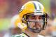 KANSAS CITY, MO - DECEMBER 18: Quarterback Aaron Rodgers #12 of the Green Bay Packers in action during the game against the Kansas City Chiefs on December 18, 2011 at Arrowhead Stadium in Kansas City, Missouri. (Photo by Jamie Squire/Getty Images)