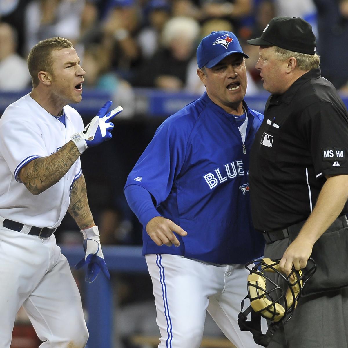 Toronto Blue Jays' Brett Lawrie keeps an eye on his hands