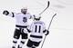 GLENDALE, AZ - MAY 15: Drew Doughty #8 of the Los Angeles Kings skates toward teammate Anze Kopitar #11 after Kopitar assisted on a goal by teammate Jeff Carter #77 (not in photo) in the second period against the Phoenix Coyotes in Game Two of the Western Conference Final during the 2012 NHL Stanley Cup Playoffs at Jobing.com Arena on May 15, 2012 in Phoenix, Arizona. (Photo by Jeff Gross/Getty Images)