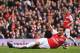 LONDON, ENGLAND - MAY 05: Robin van Persie of Arsenal celebrates scoring their third goal during the Barclays Premier League match between Arsenal and Norwich City at the Emirates Stadium on May 5, 2012 in London, England. (Photo by Bryn Lennon/Getty Images)