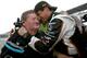 INDIANAPOLIS - MAY 21: Alex Tagliani driver of the #77 Bowers & Wilkens/Sam Schmidt Motorsports Dallara Honda celebrates winning the pole position with team owner sam Schmidt during qualifying for the the 95th Indianapolis 500 Mile Race at the Indianapolis Motor Speedway on May 21, 2011 in Indianapolis, Indiana. (Photo by Jonathan Ferrey/Getty Images)