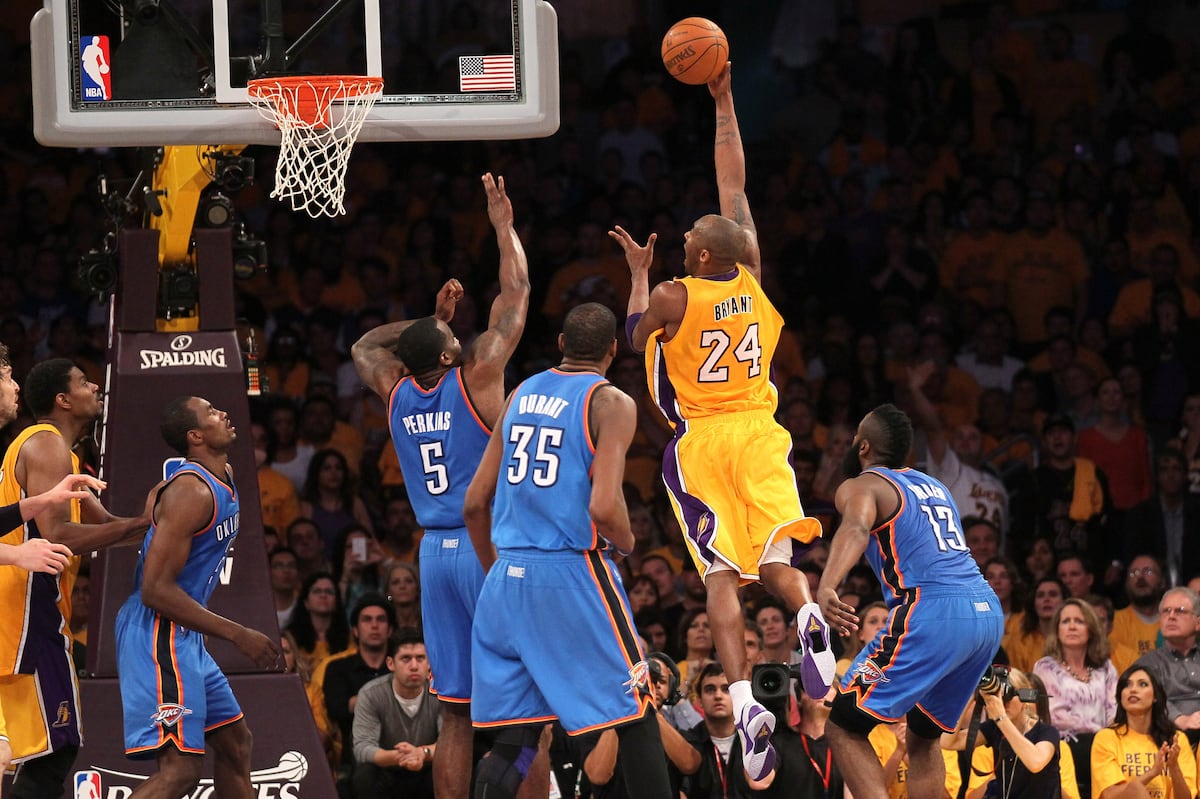 Lakers and Thunder players in action during a intense playoff game