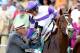 BALTIMORE, MD - MAY 19: Mario Gutierrez is congratulated by Dennis O'Neill after riding I'll Have Another to win the 137th Preakness Stakes at Pimlico Race Course on May 19, 2012 in Baltimore, Maryland. (Photo by Matthew Stockman/Getty Images)
