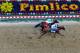 BALTIMORE, MD - MAY 19: I'll Have Another #9 ridden by Mario Gutierrez beats Bodemeister #7 ridden by Mike E. Smith at the finish line to win the 137th running of the Preakness Stakes at Pimlico Race Course on May 19, 2012 in Baltimore, Maryland. (Photo by Patrick Smith/Getty Images)
