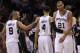 SAN ANTONIO, TX - MAY 17: (L-R) Tony Parker #9, Daniel Green #4 and Tim Duncan #21 of the San Antonio Spurs celebrate during play against the Los Angeles Clippers in Game Two of the Western Conference Semifinals of the 2012 NBA Playoffs at AT&T Center on May 17, 2012 in San Antonio, Texas. NOTE TO USER: User expressly acknowledges and agrees that, by downloading and or using this photograph, User is consenting to the terms and conditions of the Getty Images License Agreement. (Photo by Ronald Martinez/Getty Images)