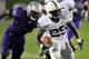 Proby, left, tries to take down Penn State tailback Silas Redd. Photo via norwalkcitizenonline.com