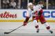 BUFFALO, NY - OCTOBER 14: Jamie McBain #4 of the Carolina Hurricanes skates against the Buffalo Sabres during their NHL game at First Niagara Center October 14, 2011 in Buffalo, New York. (Photo by Dave Sandford/Getty Images)