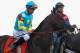 BALTIMORE, MD - MAY 19: Jockey Mike Smith aboard Bodemeister walks onto the track during the post parade of the 137th Preakness Stakes at Pimlico Race Course on May 19, 2012 in Baltimore, Maryland. (Photo by Rob Carr/Getty Images)
