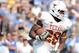 PASADENA, CA - SEPTEMBER 17: Malcolm Brown #28 of the Texas Longhorns takes a handoff against the UCLA Bruins at Rose Bowl on September 17, 2011 in Pasadena, California. (Photo by Harry How/Getty Images)