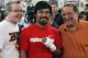 HOLLYWOOD, CA - APRIL 20: Manny Pacquiao of the Philippines (C) poses with his coach Teddy Roach (L) and promoter Bob Arum (R) during a media workout at the Wild Card Boxing Club on April 20, 2011 in Hollywood, California. (Photo by Jeff Gross/Getty Images)