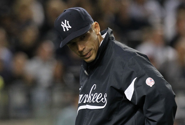 Former New York Yankees outfielder Lou Piniella with Joe Girardi