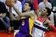 WASHINGTON, DC - MARCH 07: Matt Barnes #9 of the Los Angeles Lakers puts up a shot in front of Nick Young #1 of the Washington Wizards during the first half at the Verizon Center on March 7, 2012 in Washington, DC. NOTE TO USER: User expressly acknowledges and agrees that, by downloading and or using this photograph, User is consenting to the terms and conditions of the Getty Images License Agreement. (Photo by Rob Carr/Getty Images)