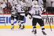 GLENDALE, AZ - MAY 22: Dustin Penner #25 of the Los Angeles Kings celebrates with teammates Slava Voynov #26, Jeff Carter #77 and Mike Richards #10 after Penner scores the game-winning goal in overtime as the Kings defeat the Phoenix Coyotes 4-3 in Game Five of the Western Conference Final during the 2012 NHL Stanley Cup Playoffs at Jobing.com Arena on May 22, 2012 in Phoenix, Arizona. (Photo by Jeff Gross/Getty Images)