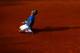 PARIS, FRANCE - JUNE 05: Rafael Nadal of Spain celebrates match point during the men's singles final match between Rafael Nadal of Spain and Roger Federer of Switzerland on day fifteen of the French Open at Roland Garros on June 5, 2011 in Paris, France. (Photo by Alex Livesey/Getty Images)