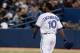 TORONTO, CANADA - APRIL 30: Edwin Encarnacion #10 of the Toronto Blue Jays walks to first after getting hit by a pitch against the Texas Rangers during MLB action at the Rogers Centre April 30, 2012 in Toronto, Ontario, Canada. (Photo by Abelimages/Getty Images)