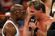 LAS VEGAS - AUGUST 24: Boxer Floyd Mayweather Jr. (L) stares down wrestler Chris Jericho during the WWE Monday Night Raw show at the Thomas & Mack Center August 24, 2009 in Las Vegas, Nevada. Mayweather was a special guest host during the broadcast. (Photo by Ethan Miller/Getty Images)