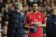 LONDON, ENGLAND - APRIL 14: Manager of Arsenal Arsene Wenger speaks to Robin Van Persie before bringing him on during the Barclays Premier League match between Tottenham Hotspur and Arsenal at White Hart Lane on April 14, 2010 in London, England. (Photo by Shaun Botterill/Getty Images)