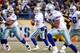 PITTSBURGH - DECEMBER 7: Quarterback Tony Romo #9 of the Dallas Cowboys drops back in the pocket to make a pass play during their NFL game against the Pittsburgh Steelers on December 7, 2008 at Heinz Field in Pittsburgh, Pennsylvania. The Steelers defeated the Cowboys 20-13. (Photo by Gregory Shamus/Getty Images)
