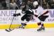 LOS ANGELES, CA - OCTOBER 25: Mike Richards #10 of the Los Angeles Kings controls the puck against Andy Greene #6 of the New Jersey Devils at Staples Center on October 25, 2011 in Los Angeles, California. The Devils won 3-0. (Photo by Stephen Dunn/Getty Images)