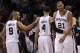 SAN ANTONIO, TX - MAY 17: (L-R) Tony Parker #9, Daniel Green #4 and Tim Duncan #21 of the San Antonio Spurs celebrate during play against the Los Angeles Clippers in Game Two of the Western Conference Semifinals of the 2012 NBA Playoffs at AT&T Center on May 17, 2012 in San Antonio, Texas. NOTE TO USER: User expressly acknowledges and agrees that, by downloading and or using this photograph, User is consenting to the terms and conditions of the Getty Images License Agreement. (Photo by Ronald Martinez/Getty Images)