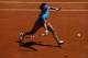 PARIS, FRANCE - MAY 26: Li Na of China plays a forehand during a practice session ahead of the 2012 French Open at Roland Garros on May 26, 2012 in Paris, France. (Photo by Dan Istitene/Getty Images)