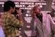 BEVERLY HILLS, CA - FEBRUARY 21: Manny Pacquiao (L) uses a photographer's camera to take a shot of Timothy Bradley at a press conference announcing their upcoming World Boxing Organization welterweight championship fight at The Beverly Hills Hotel on February 21, 2012 in Beverly Hills, California. (Photo by Stephen Dunn/Getty Images)
