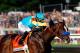 BALTIMORE, MD - MAY 19: Jockey Mike Smith aboard Bodemeister comes out of the fourth turn during the 137th Preakness Stakes at Pimlico Race Course on May 19, 2012 in Baltimore, Maryland. (Photo by Rob Carr/Getty Images)