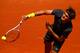 PARIS, FRANCE - MAY 28: Roger Federer of Switzerland serves in the men's singles first round match between Roger Federer of Switzerland and Tobias Kamke of Germany during day two of the French Open at Roland Garros on May 28, 2012 in Paris, France. (Photo by Clive Brunskill/Getty Images)