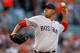 BALTIMORE, MD - MAY 22: Starting pitcher Felix Doubront #61 of the Boston Red Sox throws to a Baltimore Orioles batter during the first inning at Oriole Park at Camden Yards on May 22, 2012 in Baltimore, Maryland. (Photo by Rob Carr/Getty Images)