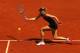 PARIS, FRANCE - MAY 29: Maria Sharapova of Russia plays a forehand in her women's singles first round match against Alexandra Cadantu of Romania during day 3 of the French Open at Roland Garros on May 29, 2012 in Paris, France. (Photo by Matthew Stockman/Getty Images)
