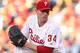 PHILADELPHIA - MAY 22: Starting pitcher Roy Halladay #34 of the Philadelphia Phillies throws a pitch during a game against the Washington Nationals at Citizens Bank Park on May 22, 2012 in Philadelphia, Pennsylvania. (Photo by Hunter Martin/Getty Images)