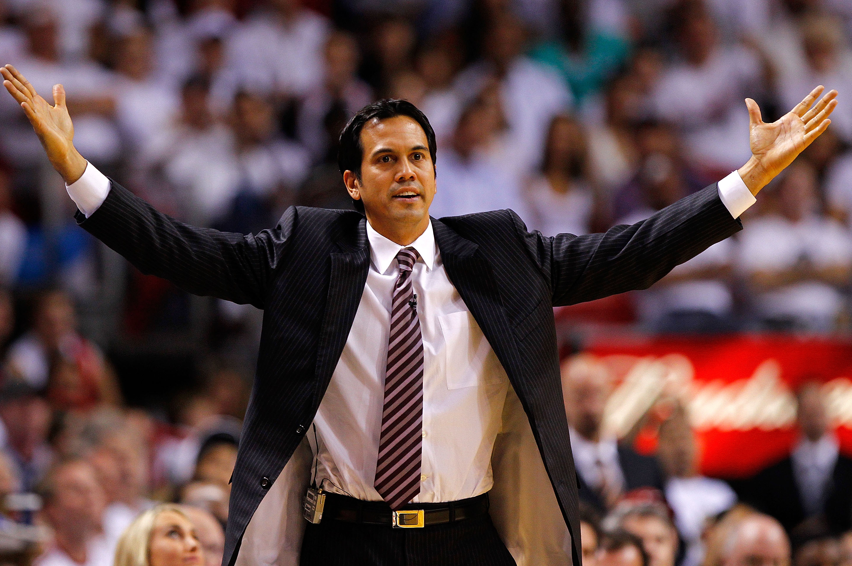 Miami Heat head coach Erik Spoelstra, right, presents a 2011-12