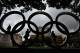 GLASGOW, SCOTLAND - MAY 31: Simon Miezetis and Zivile Steckyte from Lithuania stand on the Olympic Rings following ther unveiling on May 31, 2012 in Glasgow, Scotland. The five meter high structure weighs three tonnes and was unveiled in George Square ahead of the 2012 Olympic relay and football, being held at Hampden Park in July and August (Photo by Jeff J Mitchell/Getty Images)
