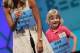NATIONAL HARBOR, MD - MAY 30: 6-year old Lori Anne C. Madison of Woodbridge, Virginia stands with ESPN reporter Samantha Steele after the second round of the 2012 Scripps National Spelling Bee competition May 30, 2012 in National Harbor, Maryland. 278 spellers are competing in the 85th annual competition. (Photo by Mark Wilson/Getty Images)