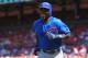 ST. LOUIS, MO - MAY 15: Alfonso Soriano #12 of the Chicago Cubs returns to the dugout after hitting a game-tying home run against the St. Louis Cardinals at Busch Stadium on May 15, 2012 in St. Louis, Missouri. (Photo by Dilip Vishwanat/Getty Images)