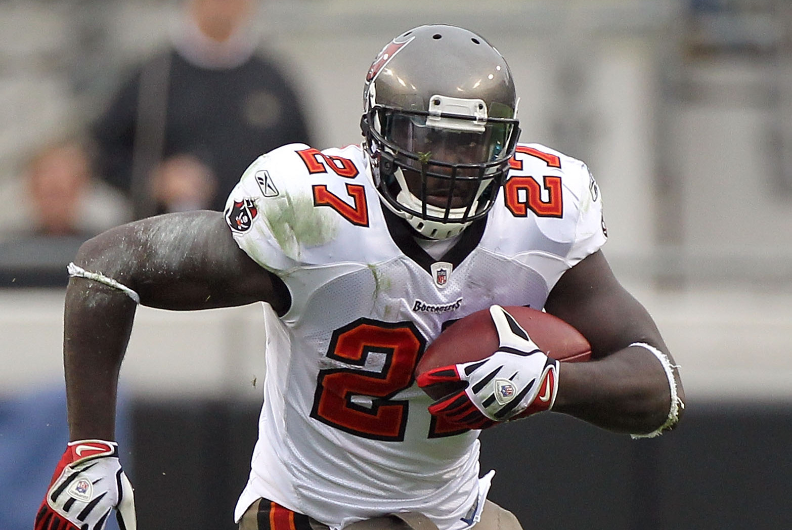 Tampa Bay Buccaneers running back LeGarrette Blount (L) hurdles