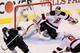 LOS ANGELES, CA - JUNE 04: Anze Kopitar #11 of the Los Angeles Kings scores against goaltender Martin Brodeur #30 of the New Jersey Devils in Game Three of the 2012 Stanley Cup Final at Staples Center on June 4, 2012 in Los Angeles, California. (Photo by Jeff Gross/Getty Images)