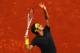 PARIS, FRANCE - JUNE 03: Roger Federer of Switzerland serves in his men's singles fourth round match against David Goffin of Belgium during day 8 of the French Open at Roland Garros on June 3, 2012 in Paris, France. (Photo by Matthew Stockman/Getty Images)