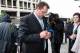 WASHINGTON - MAY 14: Former major league baseball pitcher Roger Clemens (C) signs an autograph after appearing in federal court for his perjury and obstruction trial on May 14, 2012 in Washington, DC. Clemens' former strength trainer Brian McNamee testified against Clemens as early as today. (Photo by Brendan Hoffman/Getty Images)