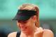 PARIS, FRANCE - JUNE 06: Maria Sharapova of Russia celebrates victory in her women's singles quarter final match against Kaia Kanepi of Estonia during day 11 of the French Open at Roland Garros on June 6, 2012 in Paris, France. (Photo by Mike Hewitt/Getty Images)