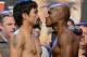 LAS VEGAS, NV - JUNE 08: Boxers Manny Pacquiao (L) and Timothy Bradley pose during the official weigh-in for their bout at the MGM Grand Garden Arena on June 8, 2012 in Las Vegas, Nevada. Pacquiao will defend his WBO welterweight title against Bradley on June 9 in Las Vegas. (Photo by Kevork Djansezian/Getty Images)